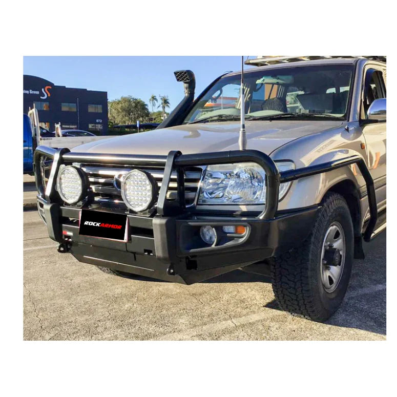 Off-road vehicle with rockarmor premium steel bullbar featuring led fog lights for Toyota Landcruiser fj100 and Lexus